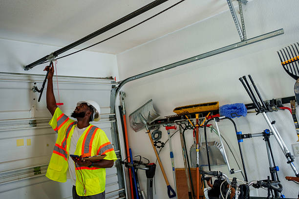Professional Garage Door Panel Replacement technician working in Stratford, OK
